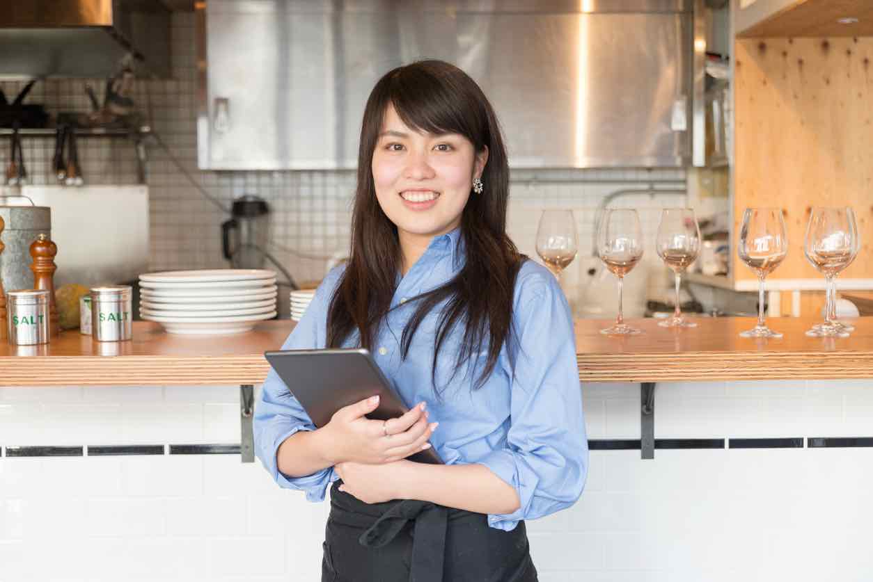 Young japanese lady manager of cafe restrant